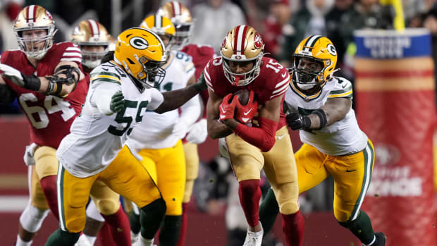 January 20, 2024; Santa Clara, CA, USA; San Francisco 49ers wide receiver Jauan Jennings (15) runs against Green Bay Packers linebacker De'Vondre Campbell (59) and linebacker Quay Walker (7) during the second quarter in a 2024 NFC divisional round game at Levi's Stadium. Mandatory Credit: Kyle Terada-USA TODAY Sports  